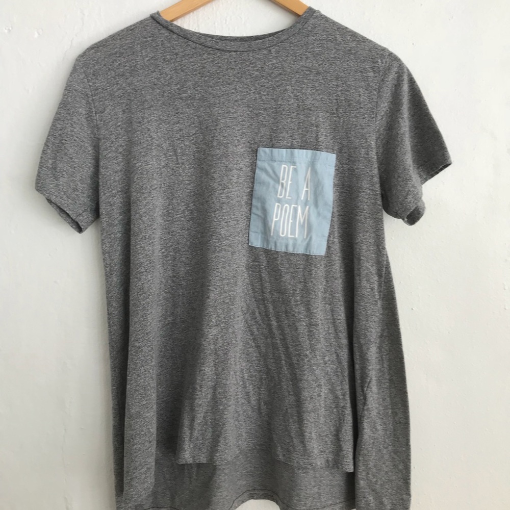 Grey “be a poem” shirt with light blue pocket